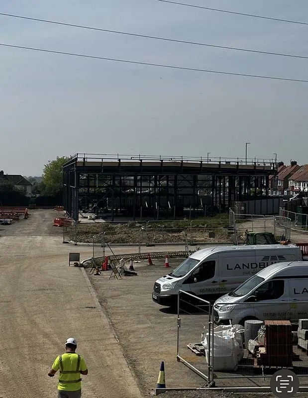 Jurial site team member in high-visibility clothing at Portslade