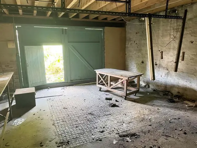 Inside the storage unit before works began