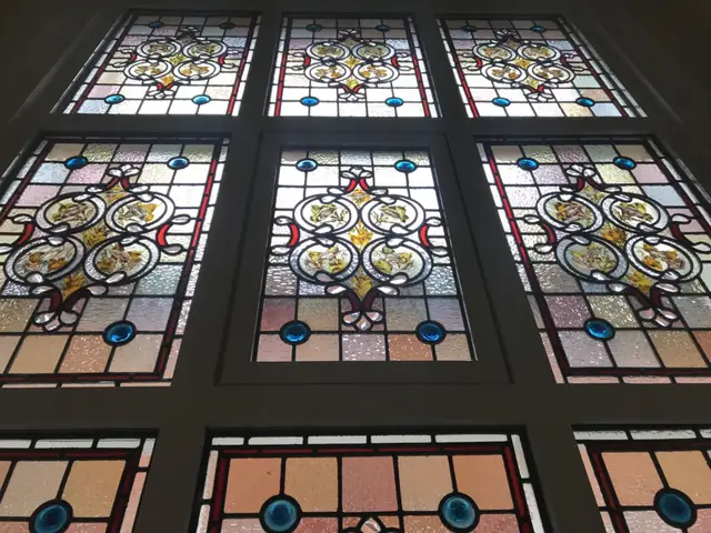 Original stained glass restored within new glazed units